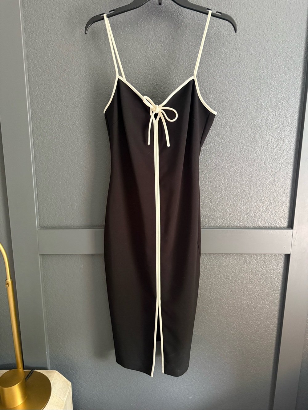 LIKELY • Black slip dress with white piping front tie detail midi Size 8